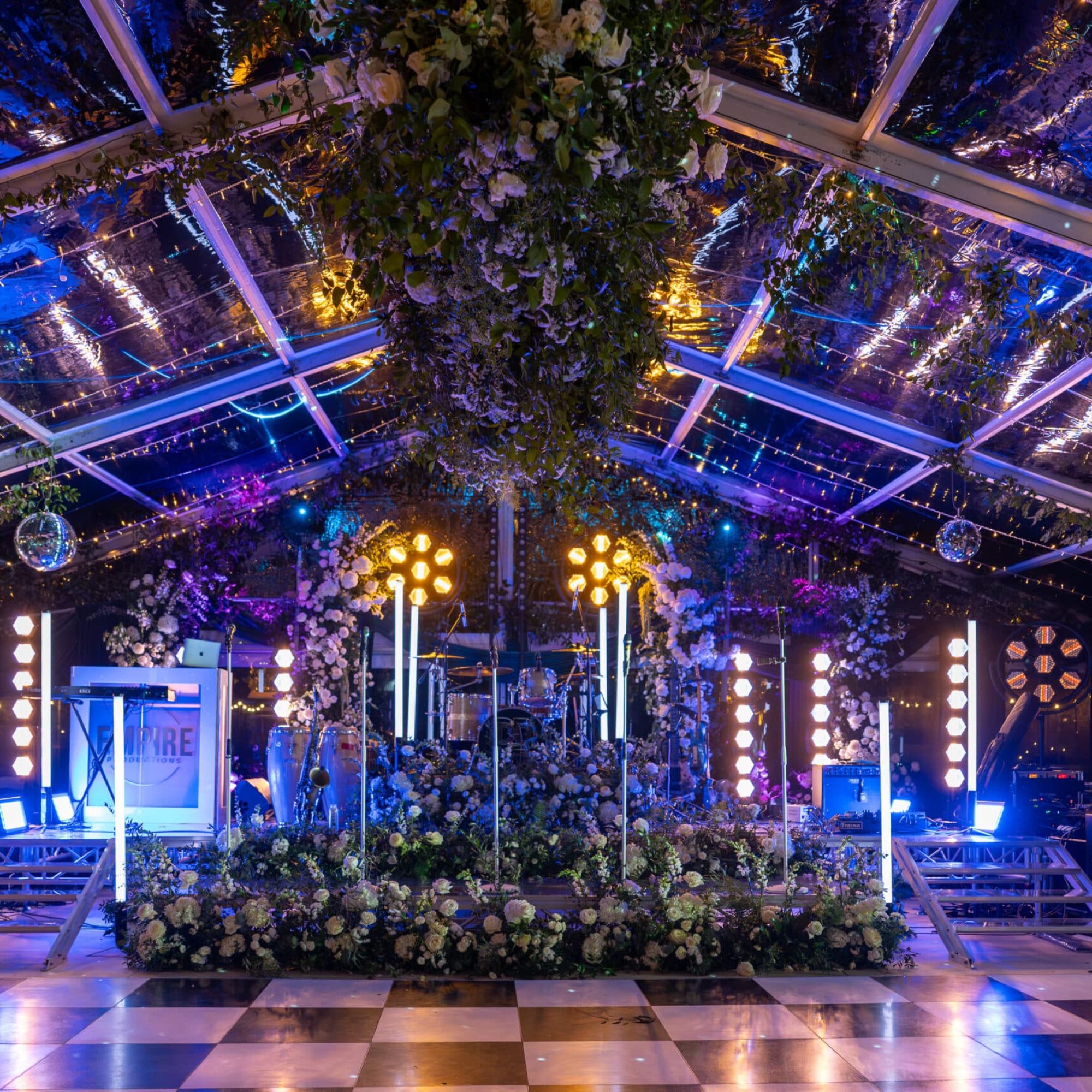 A picture taken of a stage set up for the dream band to perform on, on the grounds of Kilkea Castle, Ireland. The image showcases their entertainment and production hire services